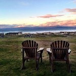 Chairs on the beach at sunset